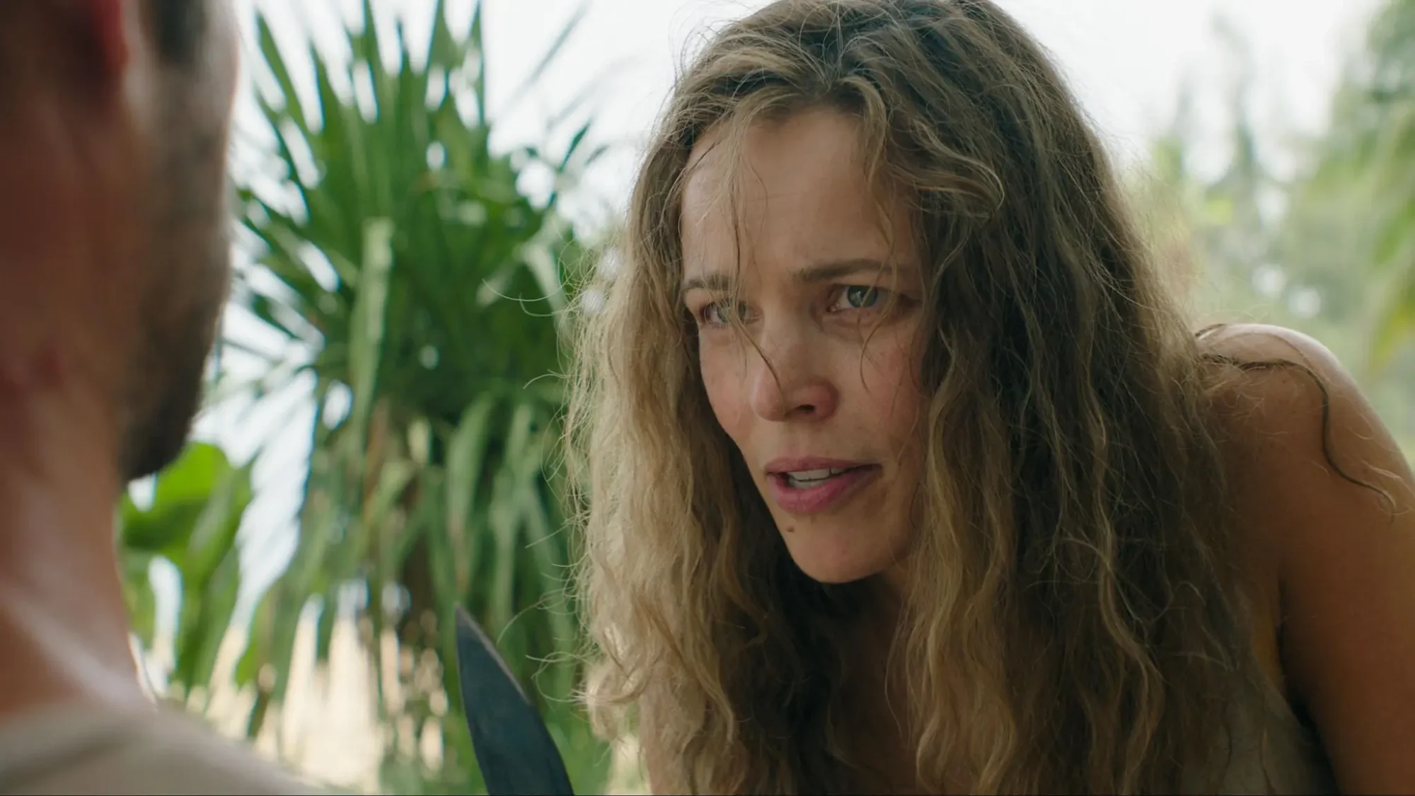 Rachel McAdams holding a knife at Dylan O'Brien in Send Help.